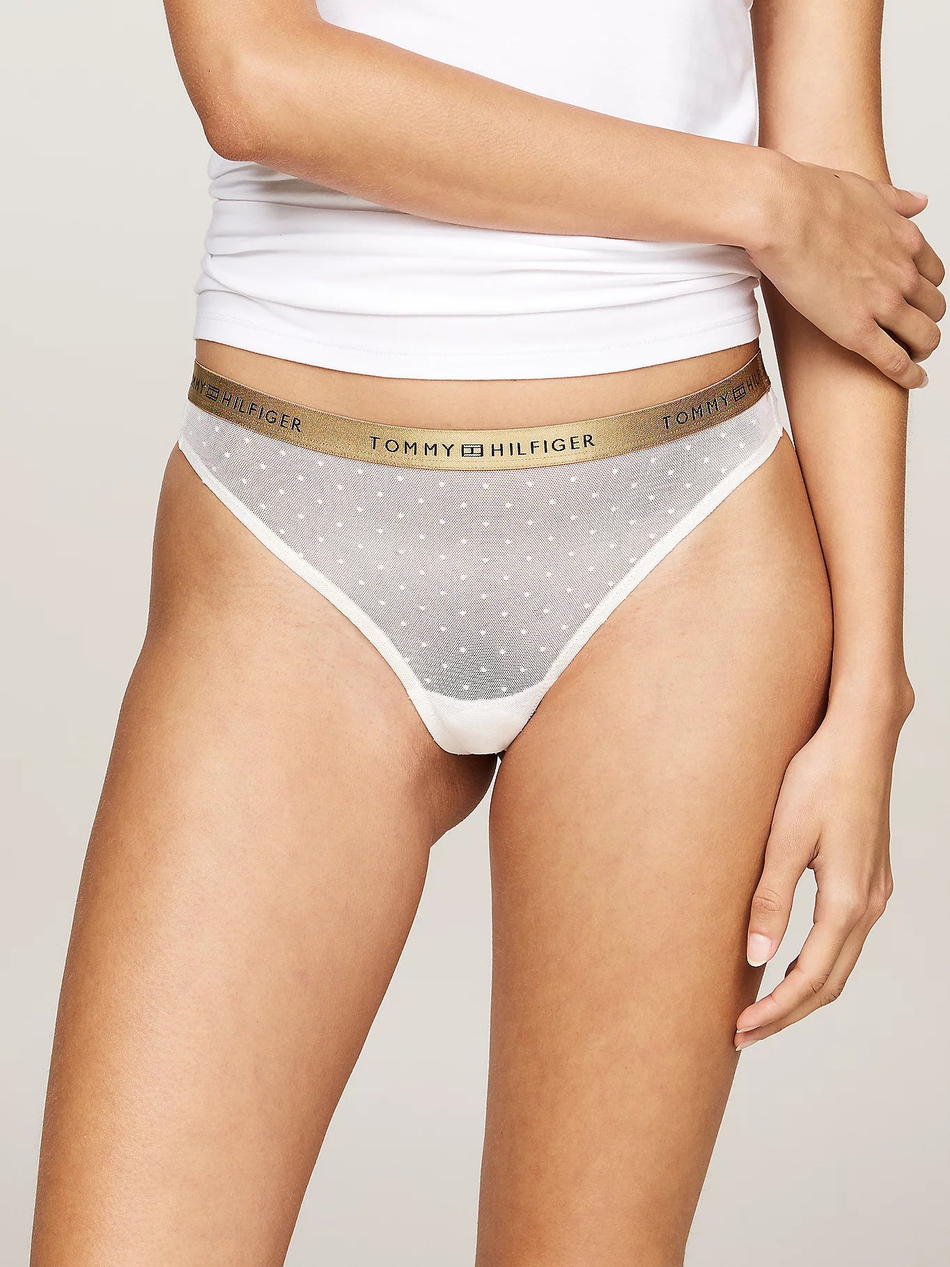 Tommy Hilfiger GIFT UNDERWEAR Womens 5 Pack Thongs Multicoloured side view of thong with gold waistband and polka dots