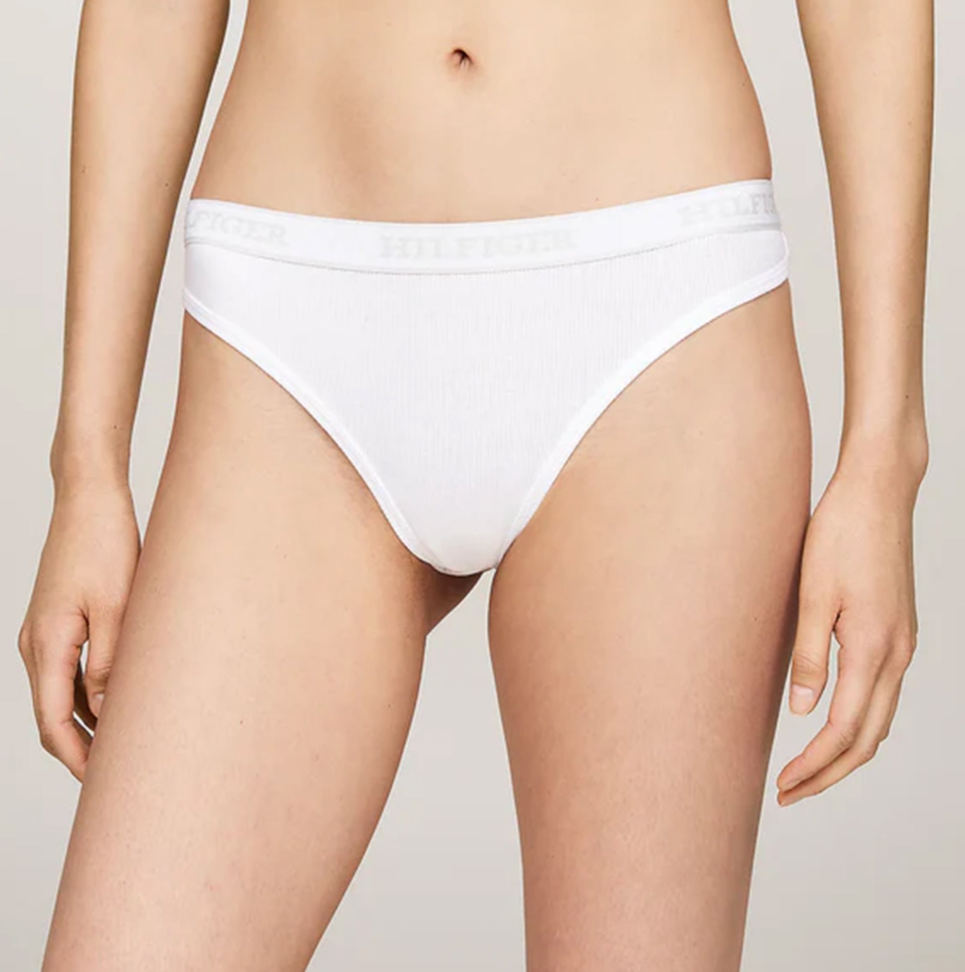 Tommy Hilfiger MONOTYPE Womens Thong White front view showcasing ribbed texture and elasticated waistband.