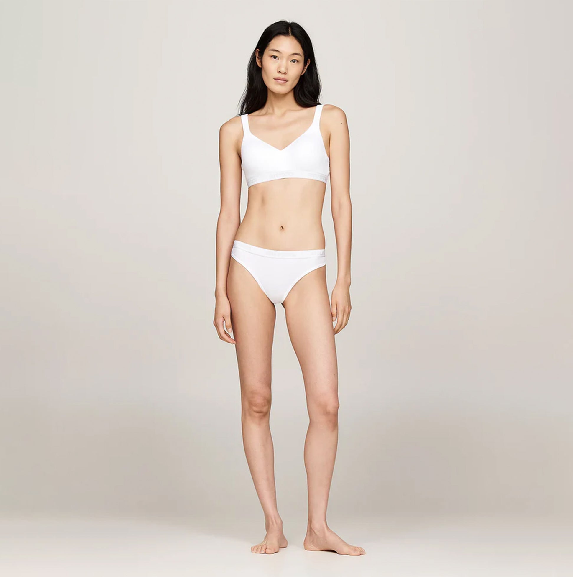 Tommy Hilfiger MONOTYPE Womens Thong White front view, showcasing ribbed texture and elasticated waistband.