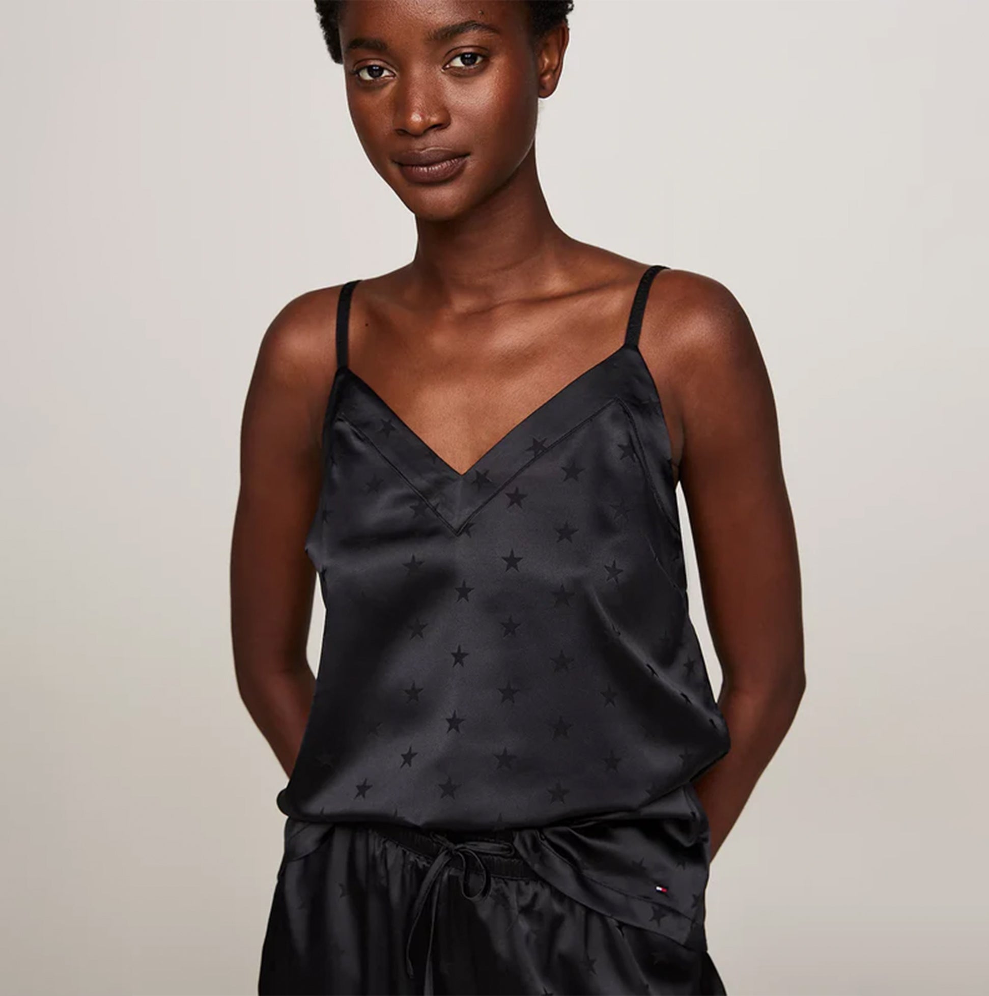 Tommy Hilfiger ESS HOLIDAY Womens Cami & Long Pants Black front view featuring spaghetti straps and star pattern.