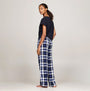 Tommy Hilfiger ORIGINAL Womens Flannel Pants Heritage Check Midi Blue Ink side view on model, showing plaid design and relaxed fit.