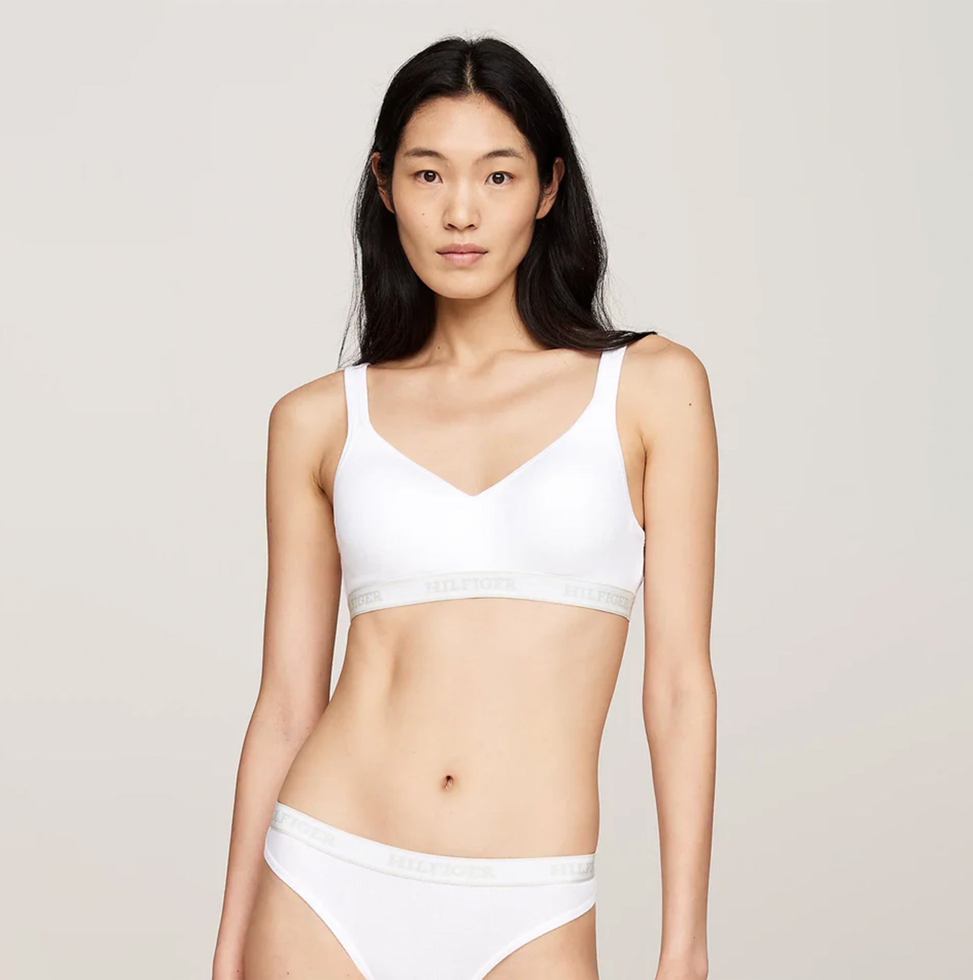 Tommy Hilfiger MONOTYPE Womens Bralette Lifts White front view, showcasing sweetheart neck and ribbed texture.