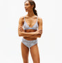 Tommy Hilfiger FLORAL LACE Womens Triangle Bra Sweet Blue side view showcasing delicate lace design and adjustable straps.