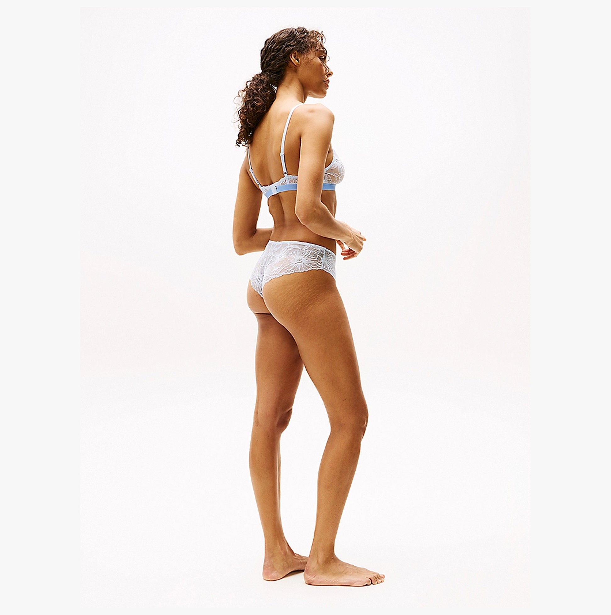 Tommy Hilfiger FLORAL LACE Womens Brazilian Briefs Sweet Blue side view model wearing stylish underwear.