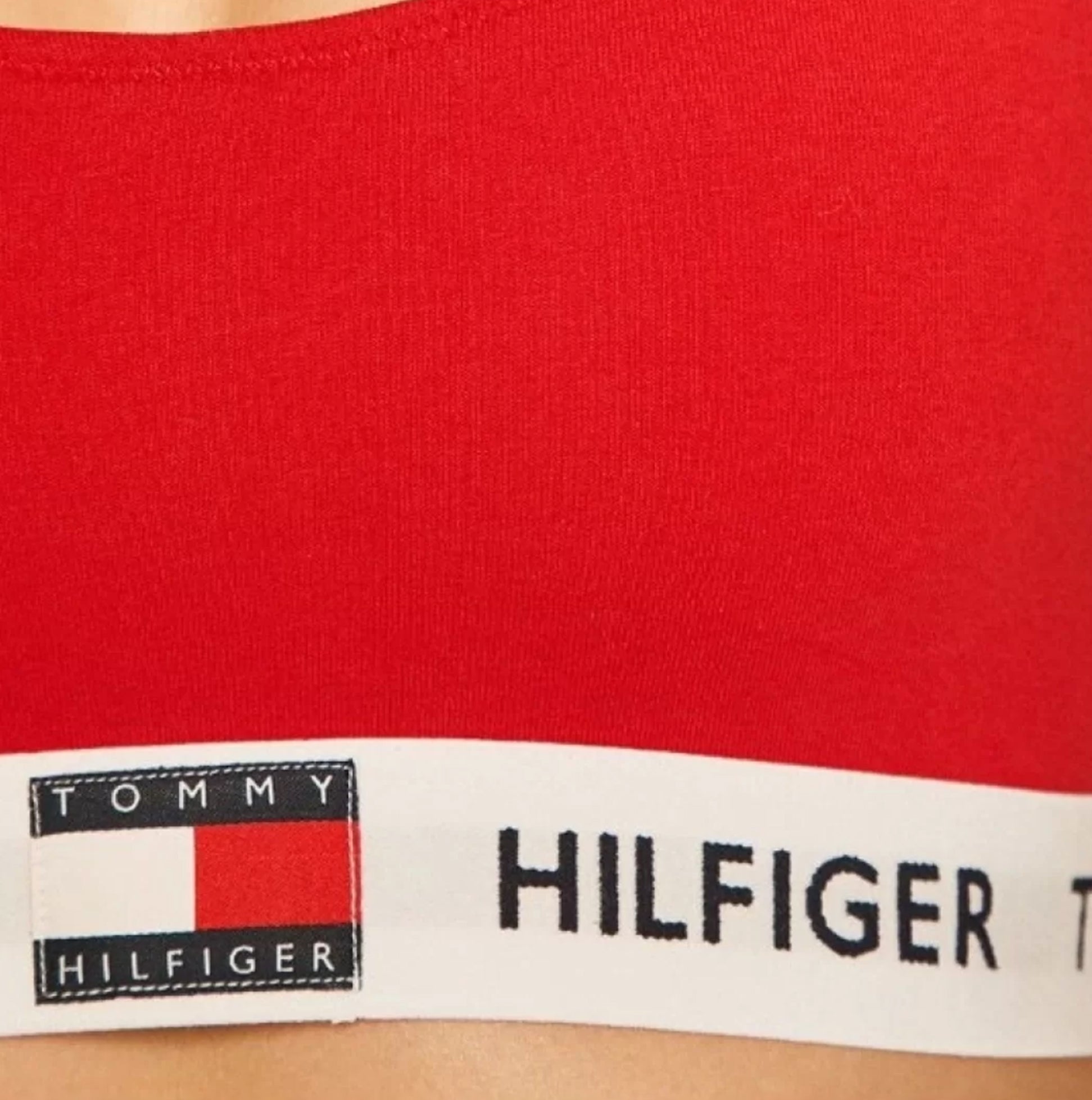Tommy Hilfiger UNLINED BRALETTE Ladies Primary Red detail view showing logo and band.