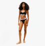 Tommy Hilfiger HERITAGE Womens Padded Push-Up Bralette Black front view model wearing the bralette with matching bottoms.