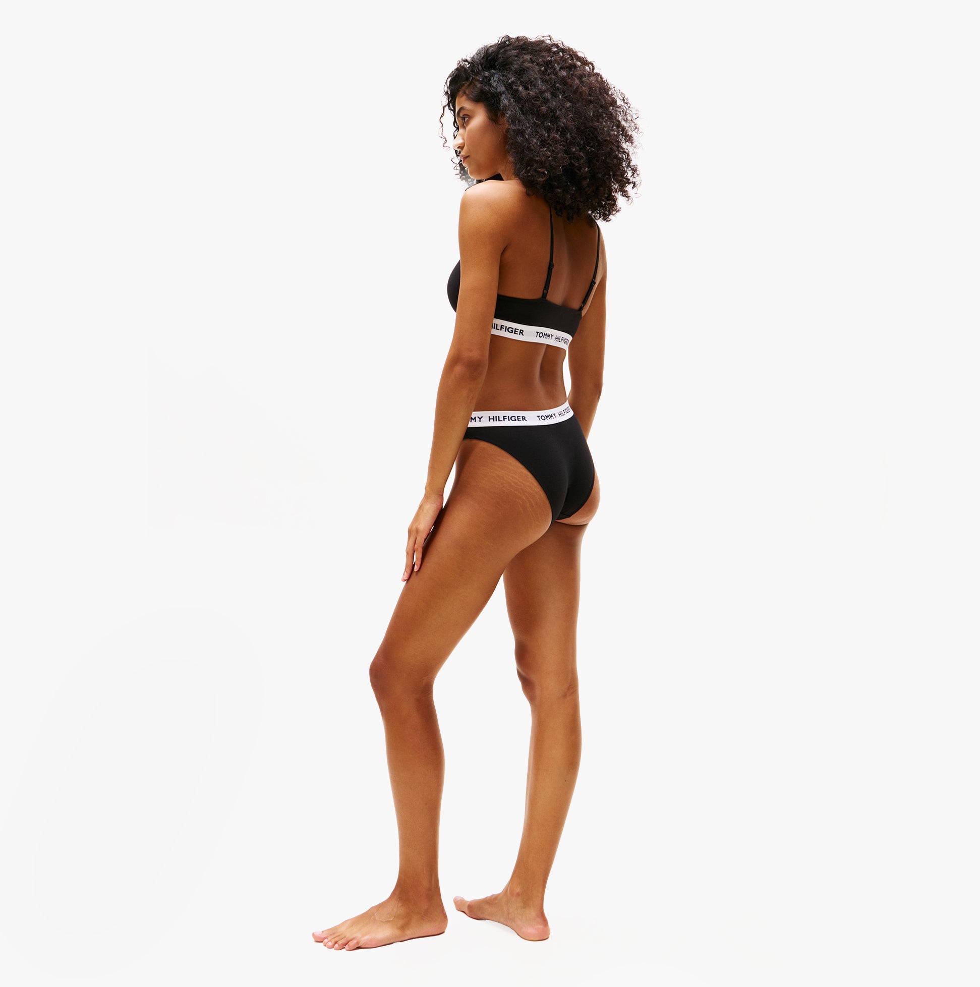 Tommy Hilfiger HERITAGE Womens Padded Push-Up Bralette Black side view displayed on model with elasticated underband.