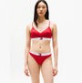 Tommy Hilfiger HERITAGE Womens Padded Push-Up Bralette Primary Red front view, showcasing padded, non-wired design with adjustable straps.