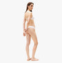 Tommy Hilfiger RIBBED Womens Unlined Triangle Bra White side view on model showcasing adjustable straps and ribbed texture.