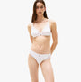 Tommy Hilfiger RIBBED Womens Unlined Triangle Bra White front view on model with lace trim and adjustable straps.
