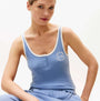 Tommy Hilfiger RIB TANK TOP Ladies Brisk Blue front view with model, showcasing lightweight fabric and sleeveless design.