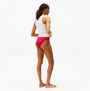 Tommy Hilfiger Womens 3 Pack Lace Trim Bikini Brief Multicolour side view on a model wearing a white tank top and red bikini briefs.
