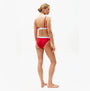 Tommy Hilfiger HERITAGE Womens Briefs Primary Red back view on model showcasing elasticated waistband and regular fit.