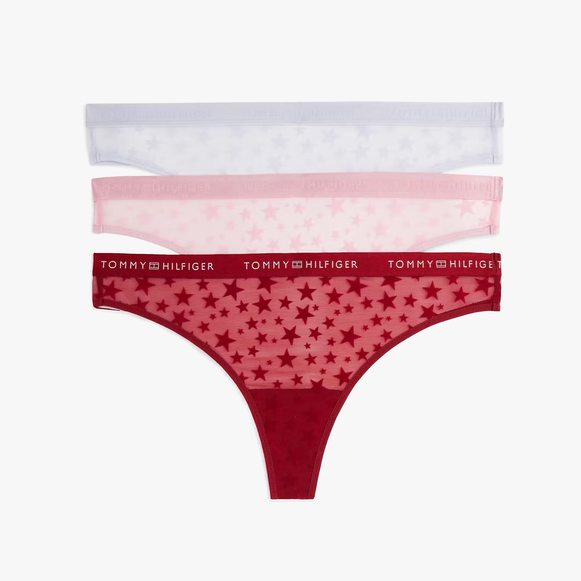 Tommy Hilfiger GIFT 3 PACK THONG Womens Thong Multicoloured in a top view displaying three styles in red, pink, and lavender