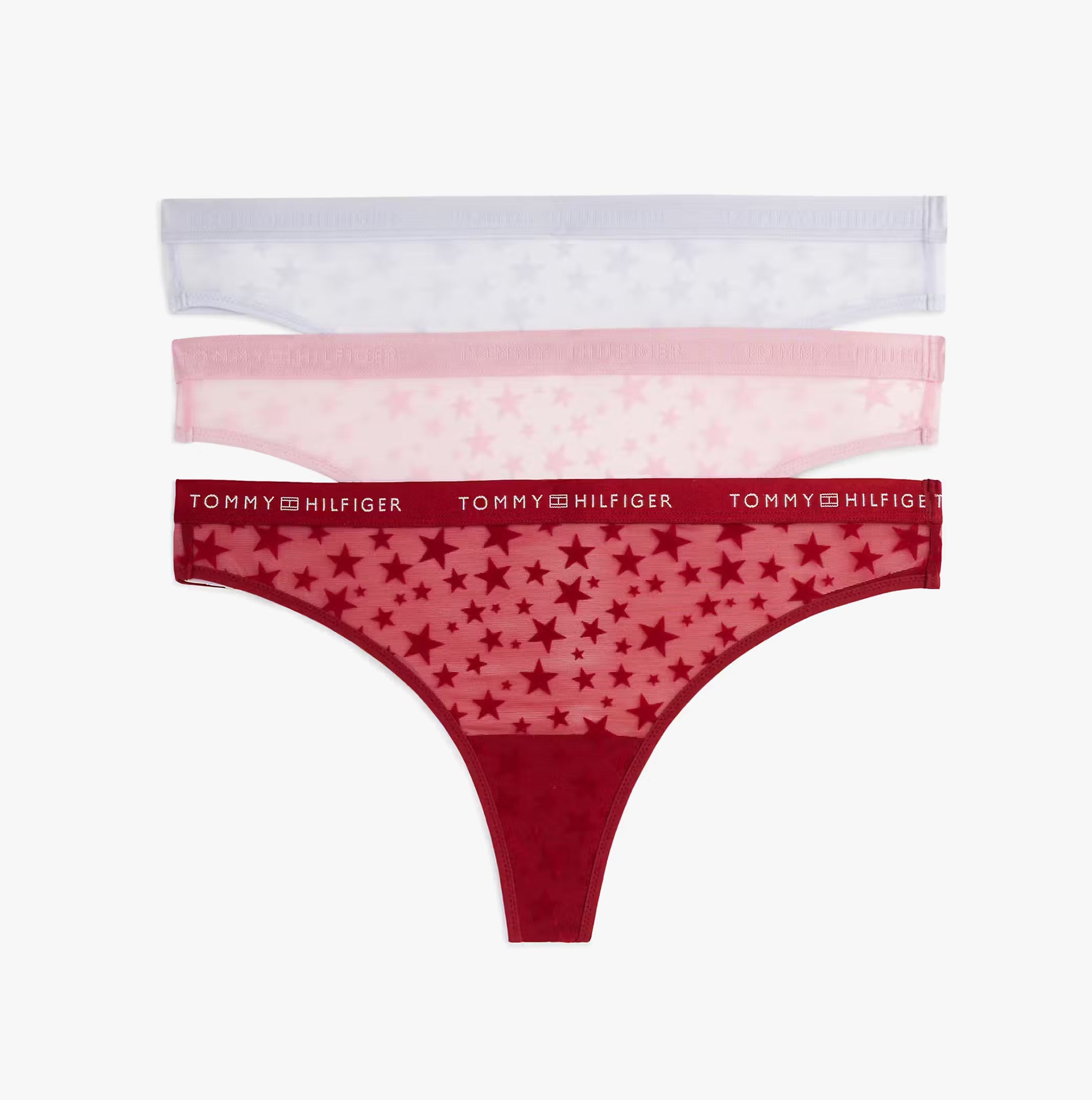 Tommy Hilfiger GIFT 3 PACK THONG Womens Thong Multicoloured in a top view displaying three styles in red, pink, and lavender