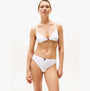 Tommy Hilfiger Womens 3 PACK THONG Multicoloured front view model wearing white thong underwear.