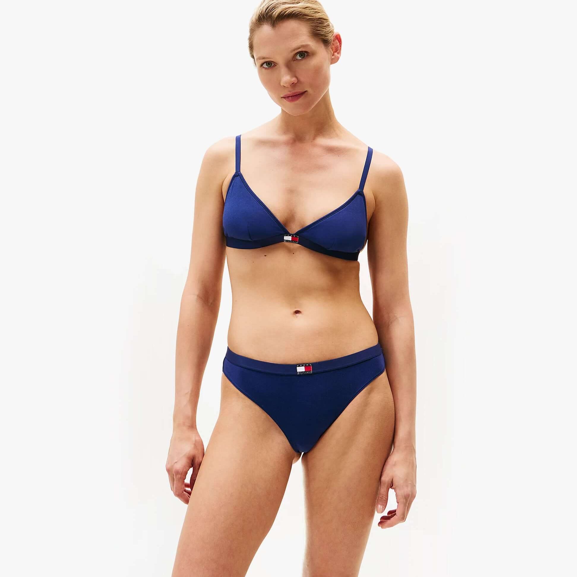 Tommy Hilfiger 3 Pack Womens TRIANGLE BRA Multicoloured Front view of a woman wearing a navy triangle bra with matching underwear.