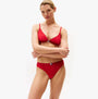 Tommy Hilfiger 3 Pack Womens TRIANGLE BRA Multicoloured, side view of model wearing red triangle bra and matching bottoms.