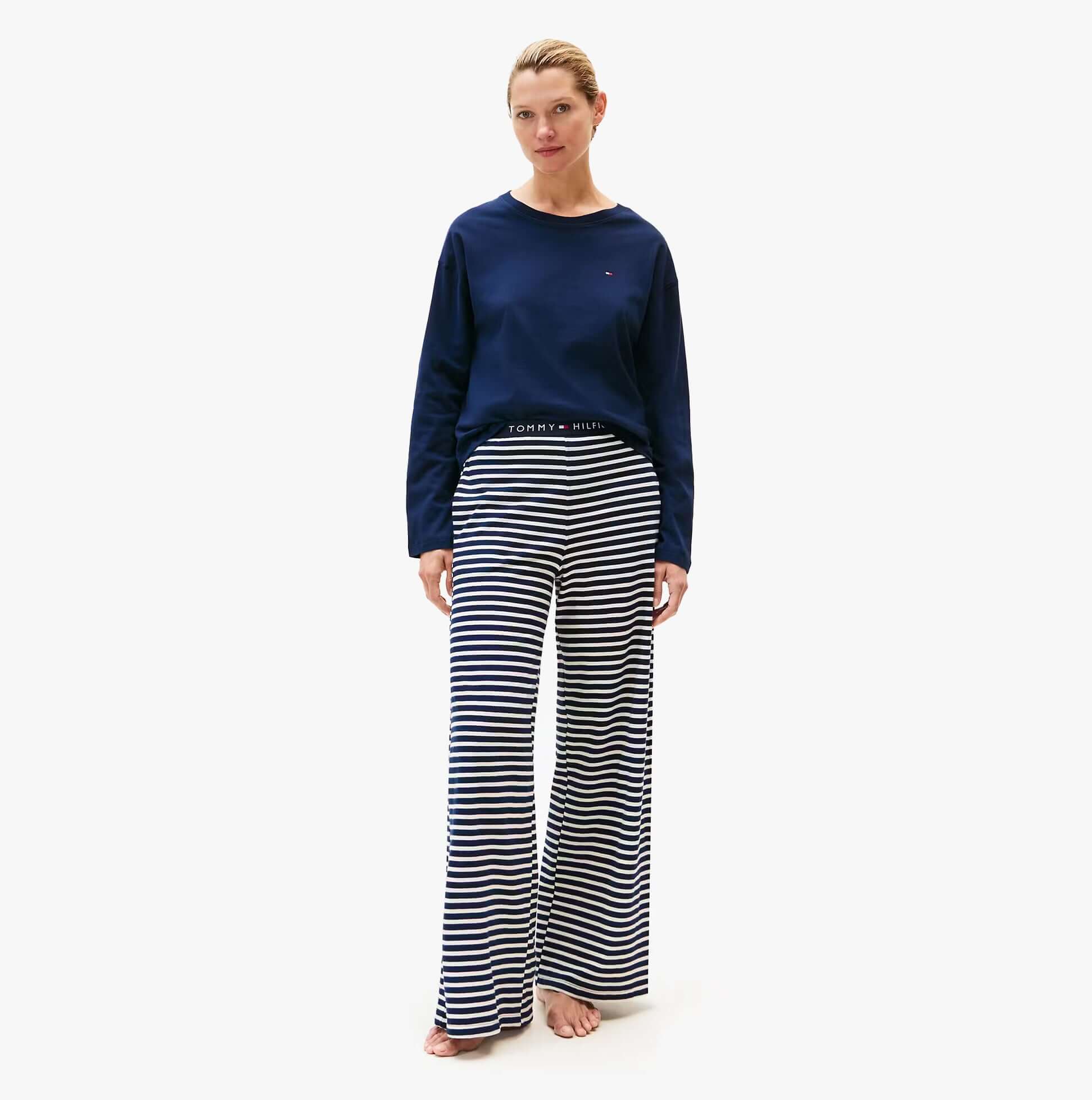 Tommy Hilfiger LS JERSEY RELAXED PJ Womens Set Multicoloured front view featuring a navy top and striped pants.