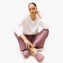 Tommy Hilfiger GIFT LS TEE FLNL SET Womens Pyjama Set Multicoloured front view with model sitting, featuring long sleeves and striped pants.