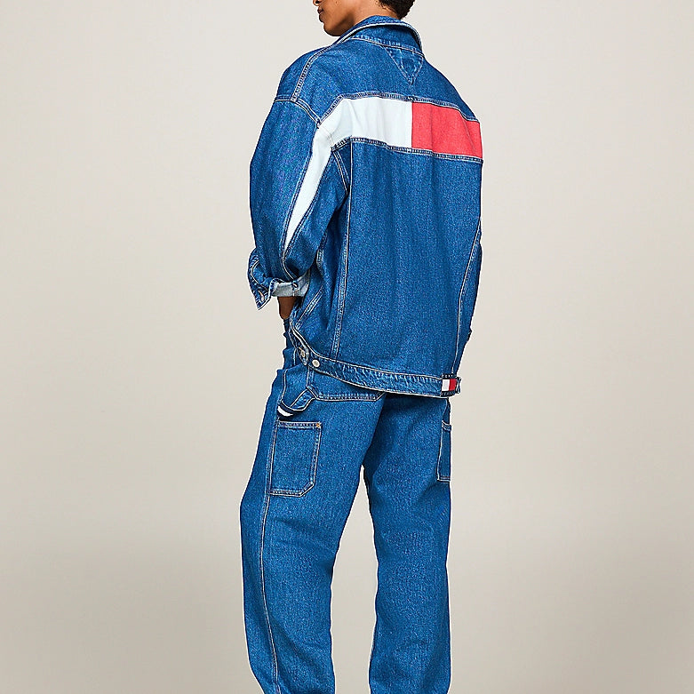Tommy Hilfiger denim outfit featuring a jacket and pants, displayed in a rear view on a model.