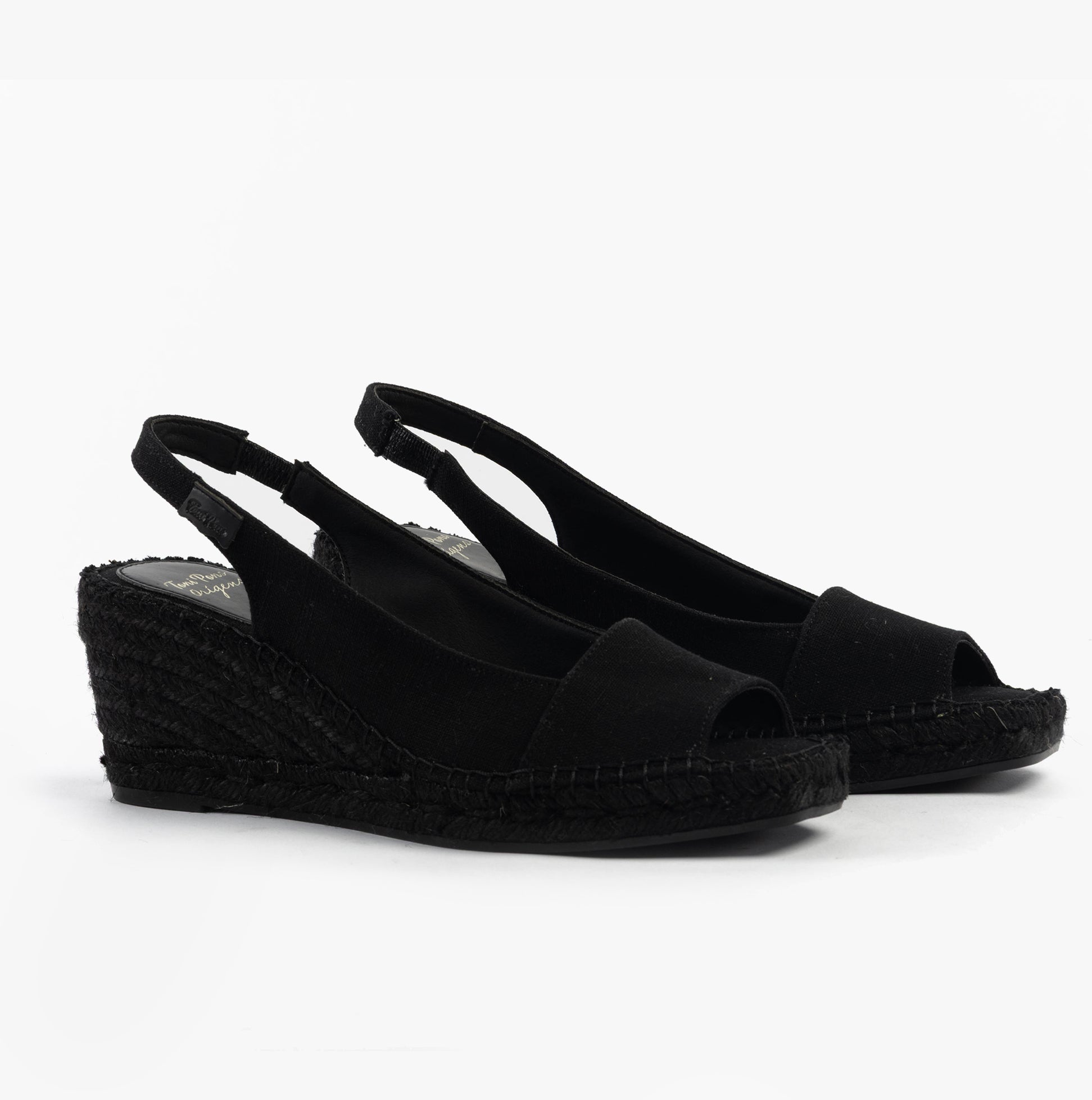 Toni Pons FIORE Womens Sandals Black side view showing wedge heel and slip-on design.