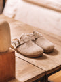 Toni Pons MIMA-FP Womens Slippers Cru side view on wooden table highlighting felt upper and rubber sole
