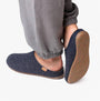 Toni Pons MONA-FR Womens Mari side view of slipper in navy felt, worn with grey pants, highlighting comfort and style.