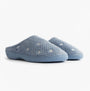 Totes Isotoner POPCORN TERRY Womens Mule Slippers Iris Blue Star side view featuring soft blue upper with star design.