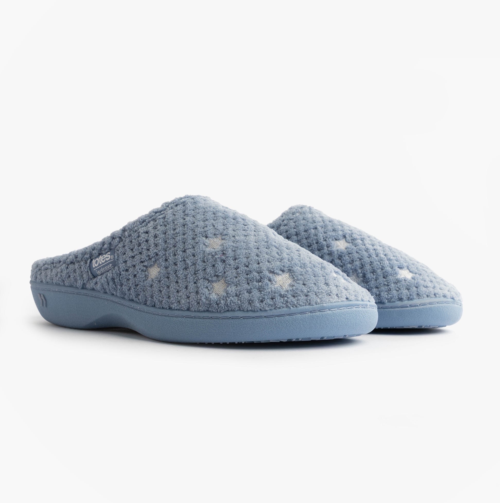 Totes Isotoner POPCORN TERRY Womens Mule Slippers Iris Blue Star side view featuring soft blue upper with star design.