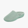 Totes Isotoner POPCORN TERRY Womens Mule Slippers Mint side view showing soft texture and slip-on design.