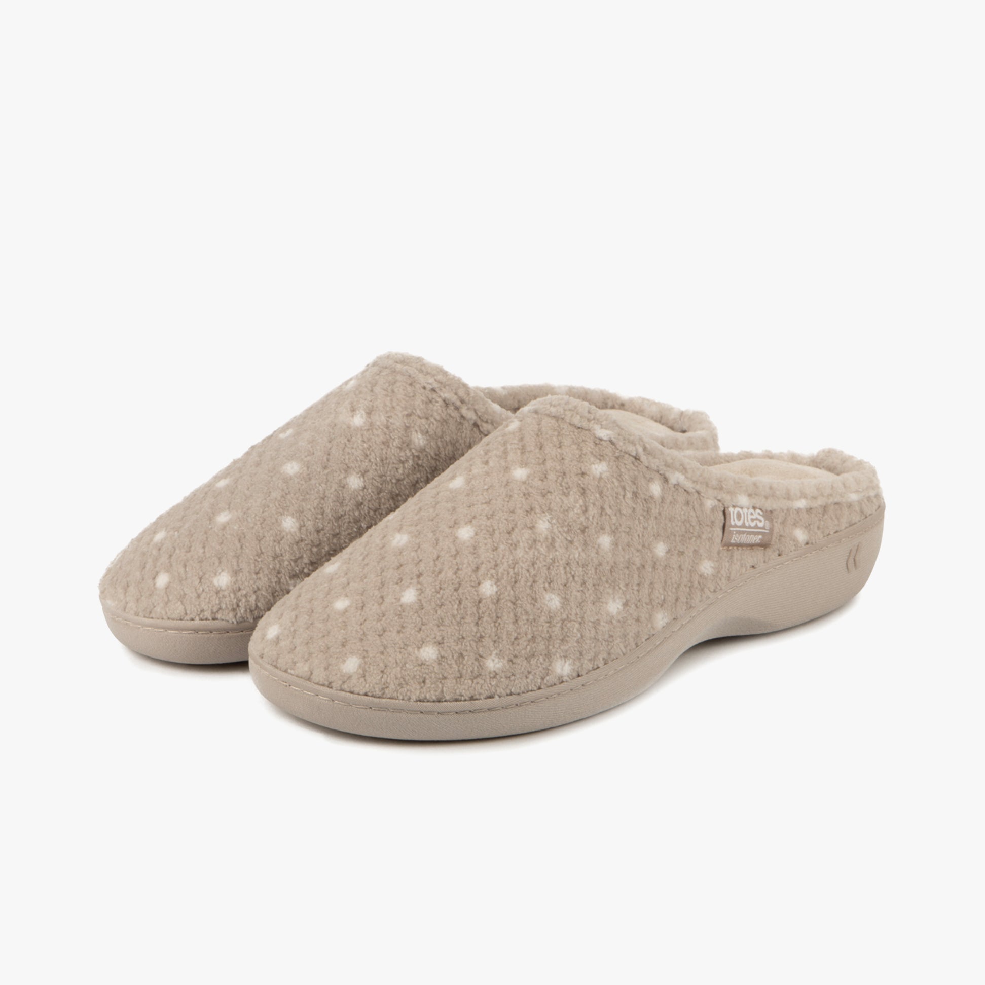 Totes Isotoner POPCORN TERRY Womens Mule Slippers Natural Spot side view showing soft, plush fabric and slip-on design.