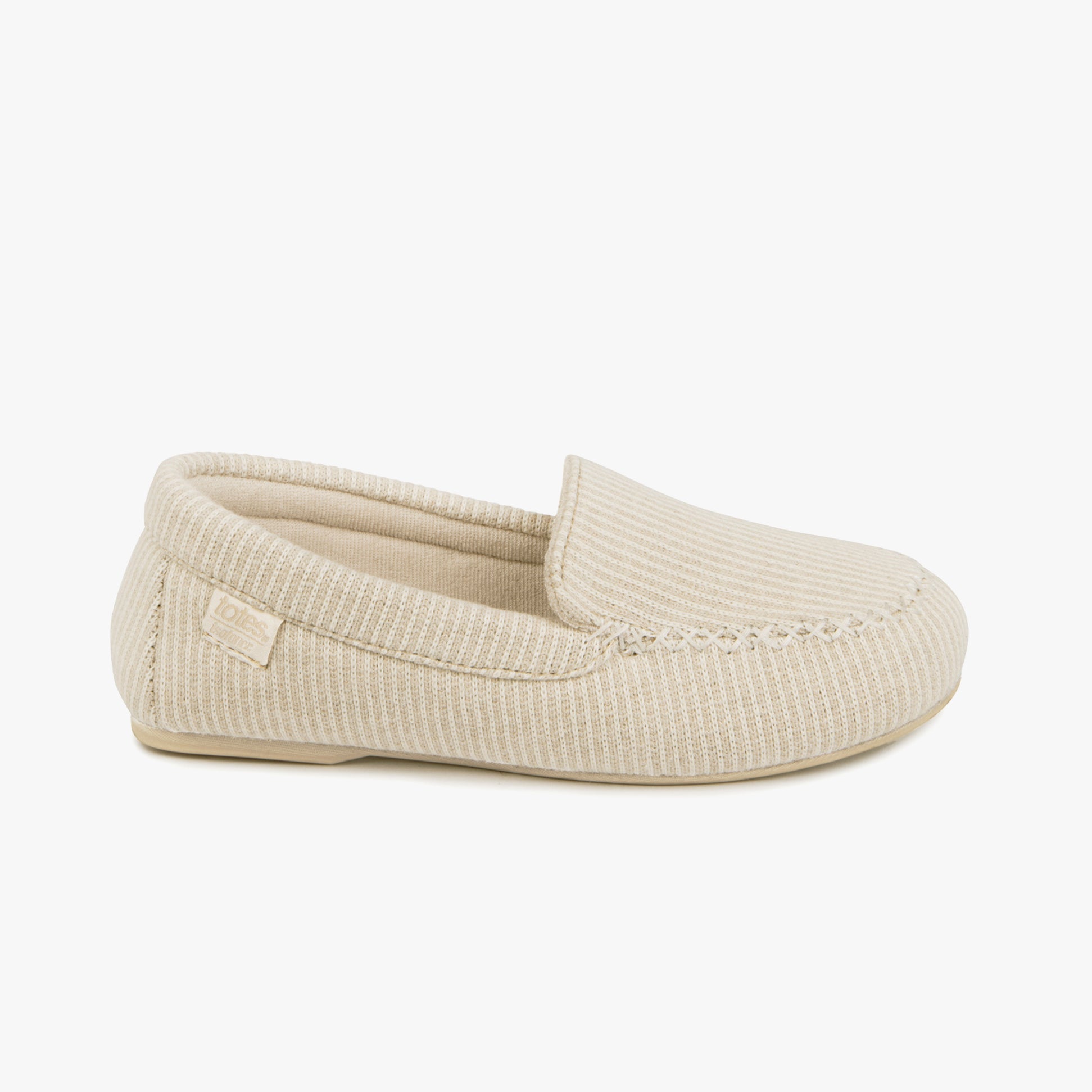 Totes Isotoner TEXTURED Womens Moccasin Slippers Beige side view showing soft cotton upper and slip-on design.