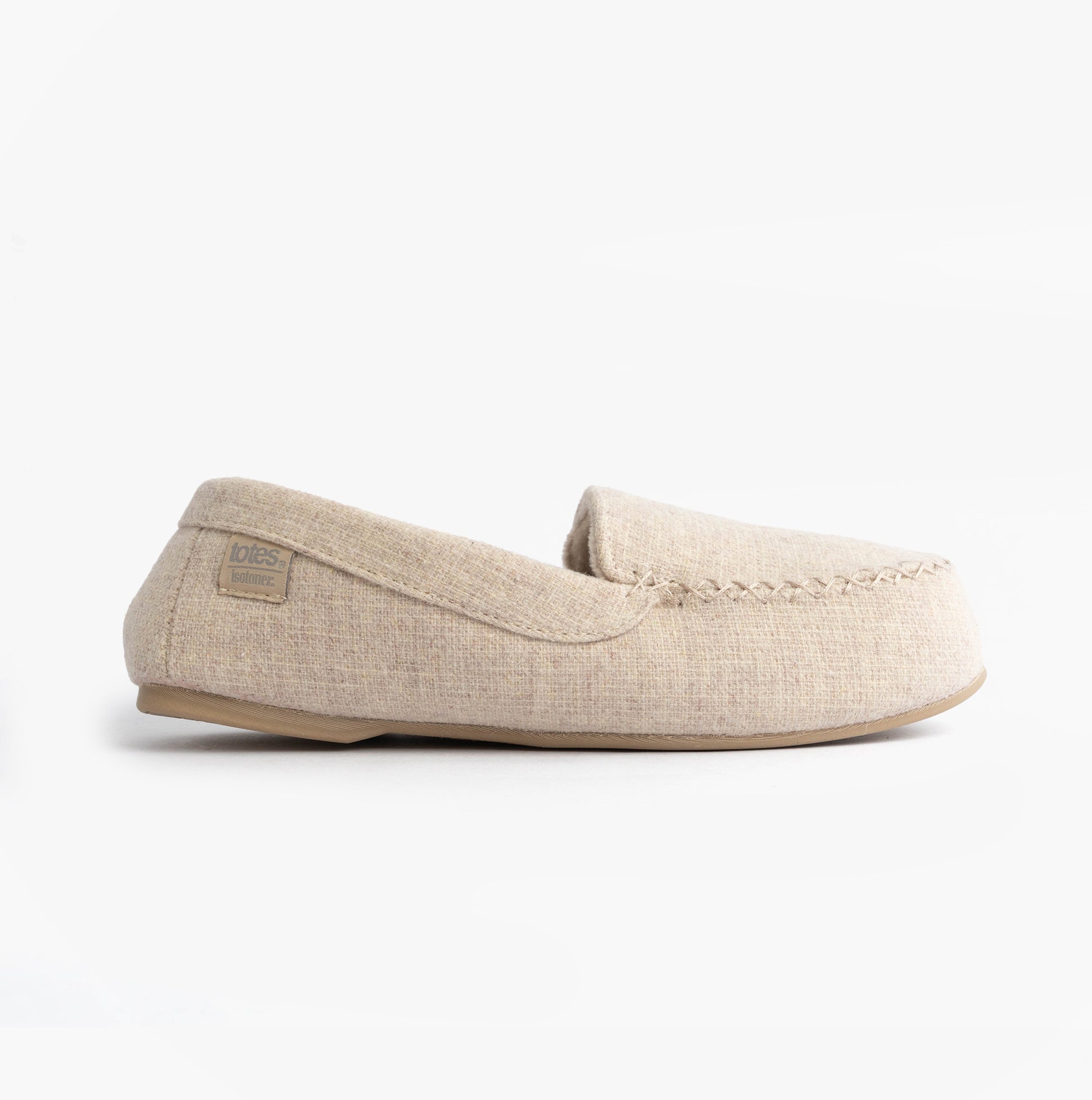 Totes Isotoner TEXTURED Womens Moccasin Slippers Light Brown side view showcasing the cotton upper and slip-on design.