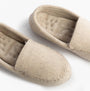 Totes Isotoner TEXTURED Womens Moccasin Slippers Light Brown top view showcasing soft cotton upper and round toe design.