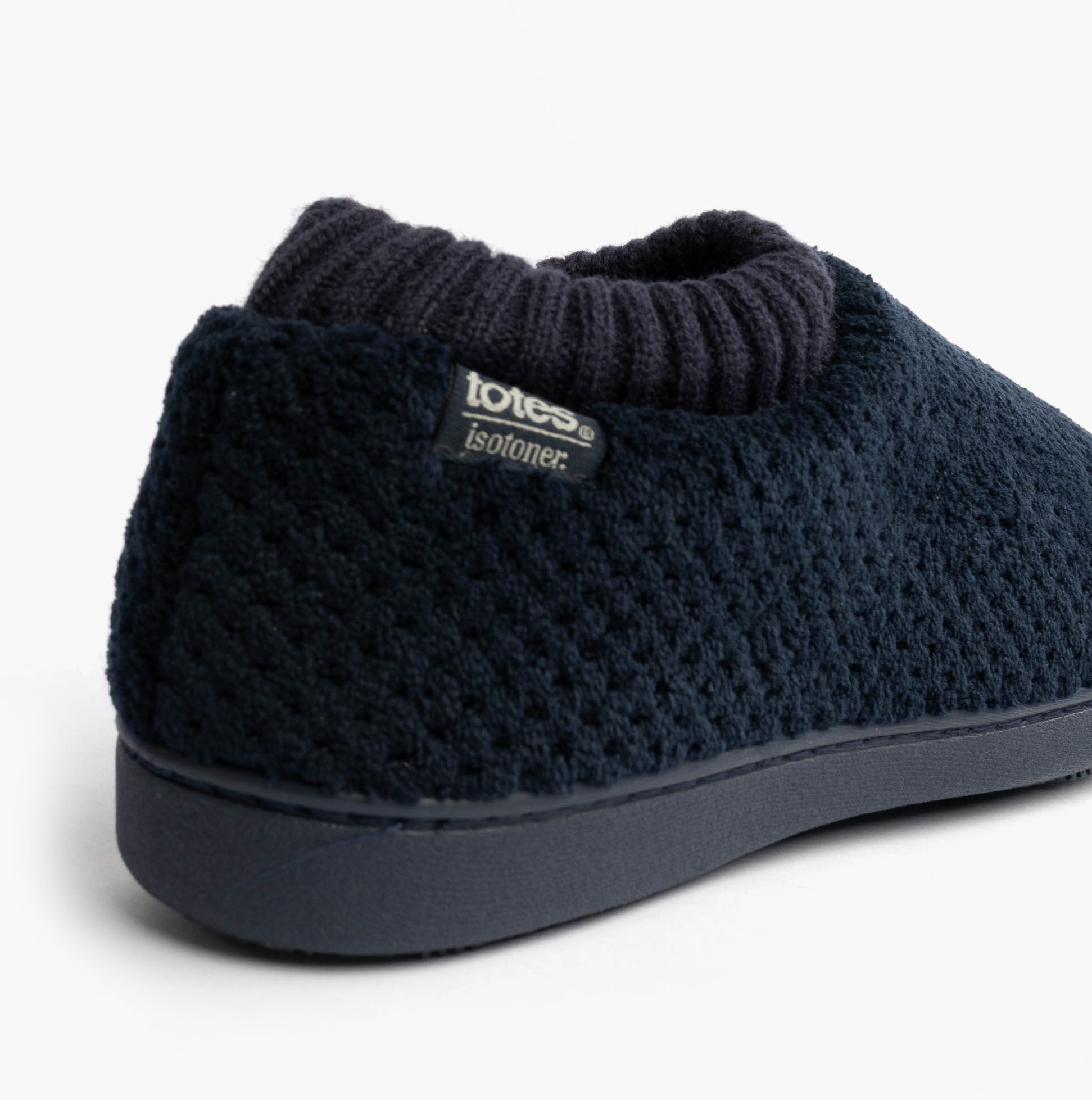 Totes Isotoner POPCORN FULL BACK BOOTIE Womens Slippers Navy, side view showing soft texture and cozy knit collar.