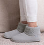 Totes Isotoner KNIT BOOT WITH FUR CUFF Womens Bootie Slippers Grey side view showing comfort and style with fur cuff.