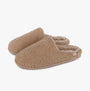 Totes Isotoner CURLY FUR MULE Womens Mule Slippers Natural side view showcasing cozy fleece texture and slip-on design.