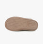 Totes Isotoner CURLY FUR MULE Womens Mule Slippers Natural bottom view sole detail with textured pattern.
