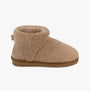 Totes Isotoner CURLY FUR BOOT Womens Bootie Slippers Natural side view showing soft curly fur material and ankle height design.