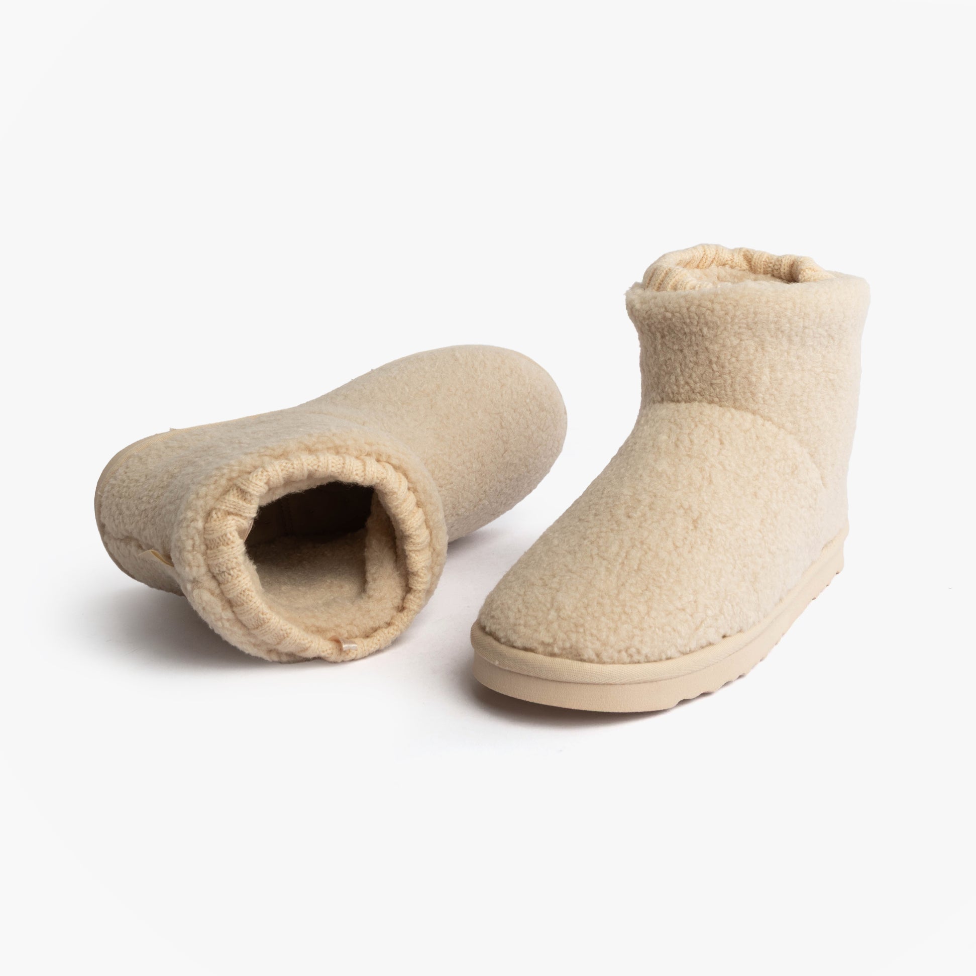 Totes Isotoner BORG BOOT WITH CUFF DETAIL Womens Boot Slippers Cream side view and front view of boot slippers.