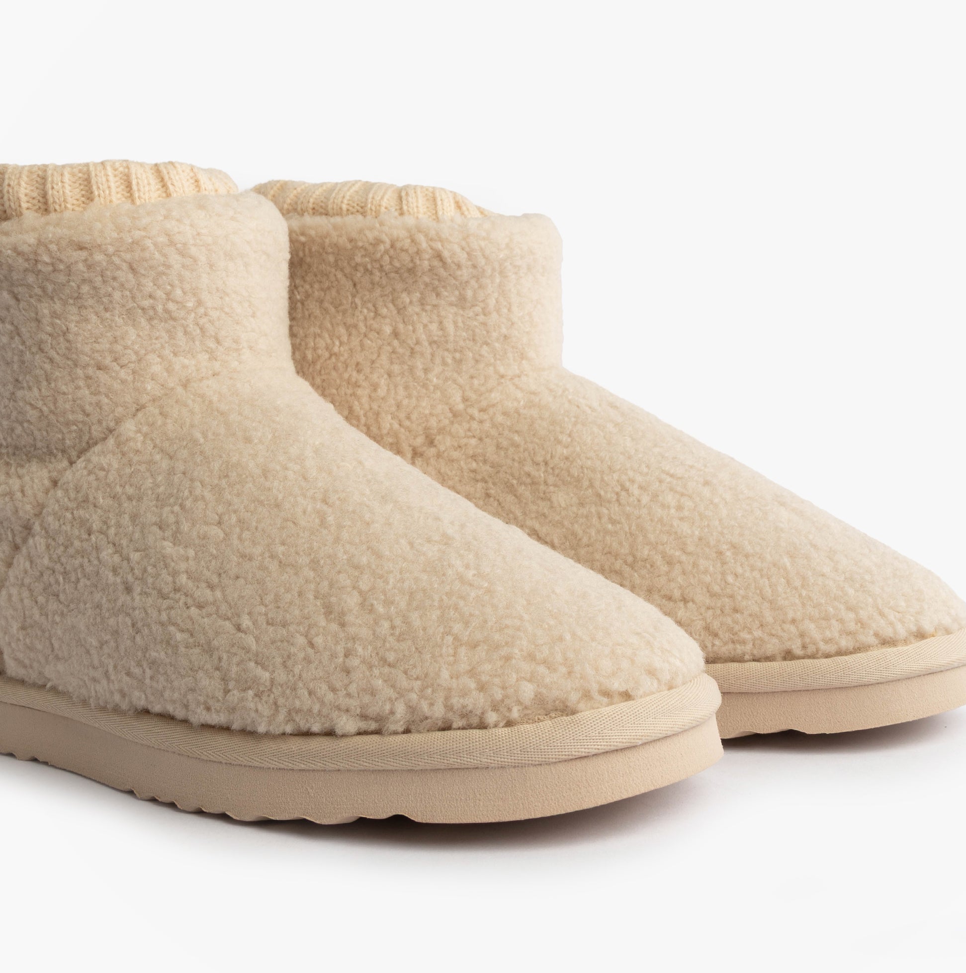 Totes Isotoner BORG BOOT WITH CUFF DETAIL Womens Boot Slippers Cream side view of slipper boots