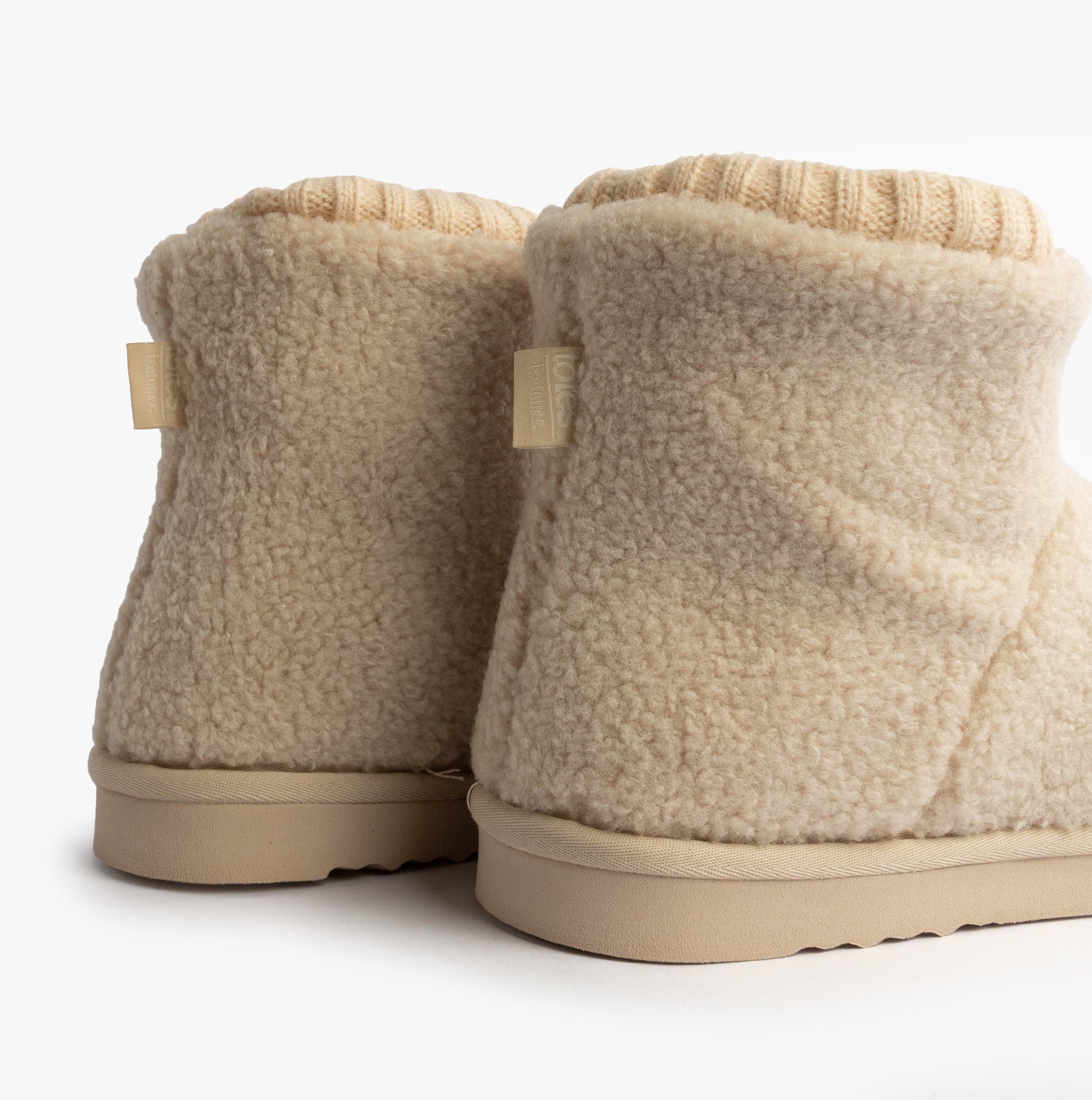 Totes Isotoner BORG BOOT WITH CUFF DETAIL Womens Boot Slippers Cream rear view with soft lining and cuff detail.