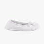 Totes Isotoner STRETCH TERRY BOW Womens Ballerina Slippers White side view, showcasing the soft terry fabric and bow design.