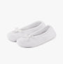 Totes Isotoner STRETCH TERRY BOW Womens Ballerina Slippers White side view with decorative bow detail.
