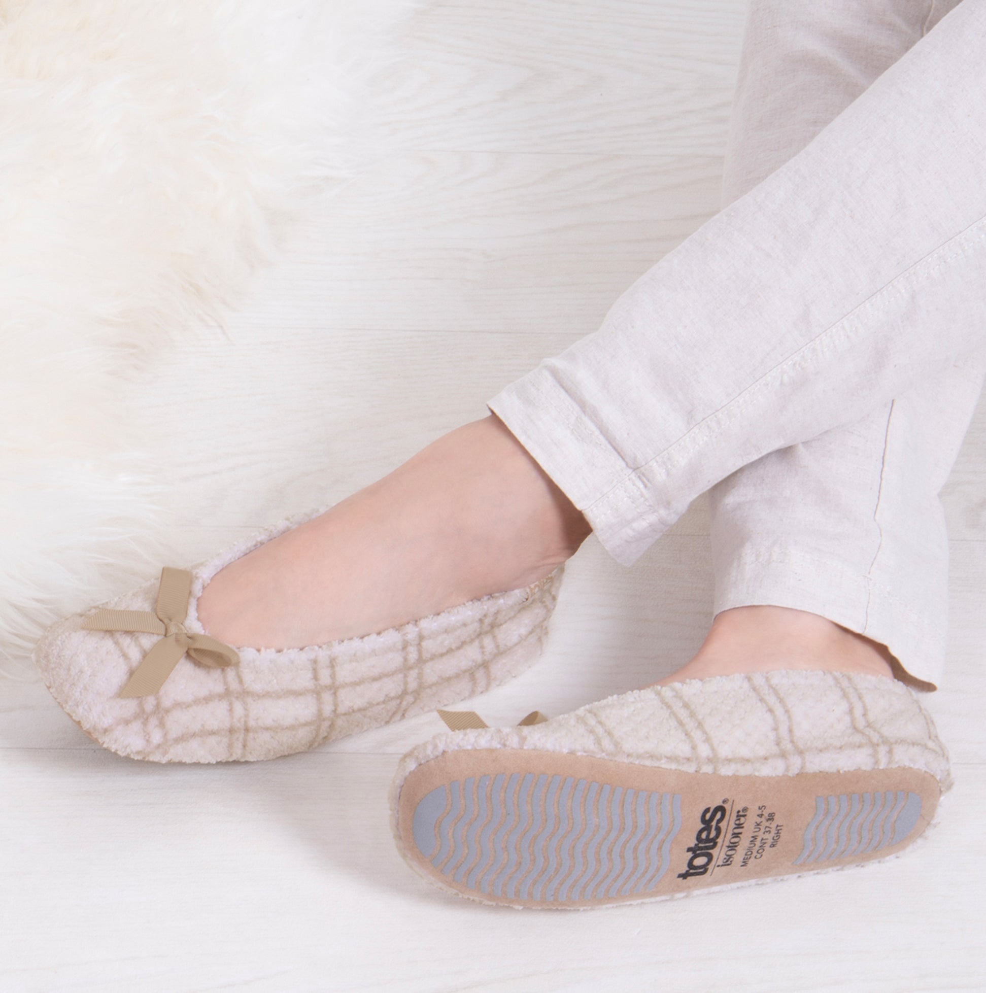 Totes Isotoner POPCORN BALLET Womens Ballerina Slippers Natural Check side view showcasing soft polyester upper and slip-resistant sole.