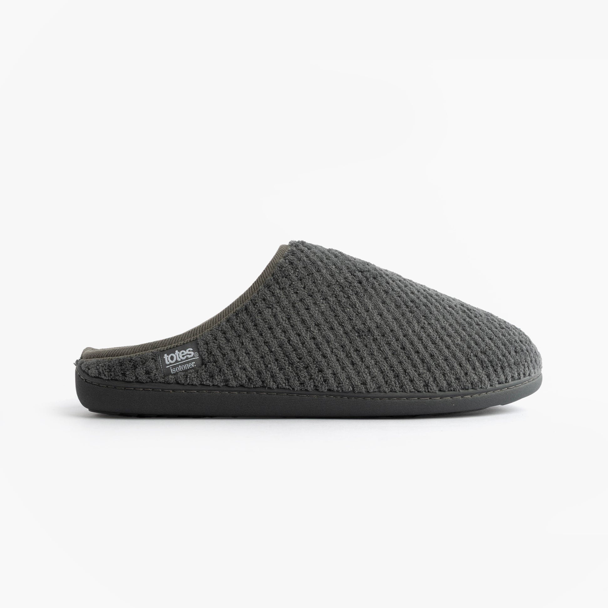 Totes Isotoner SWEPT BACK POPCORN MULE Mens Mule Slippers Grey side view showing textured upper and slip-on design.