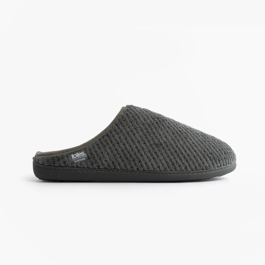 Totes Isotoner SWEPT BACK POPCORN MULE Mens Mule Slippers Grey side view showing textured upper and slip-on design.