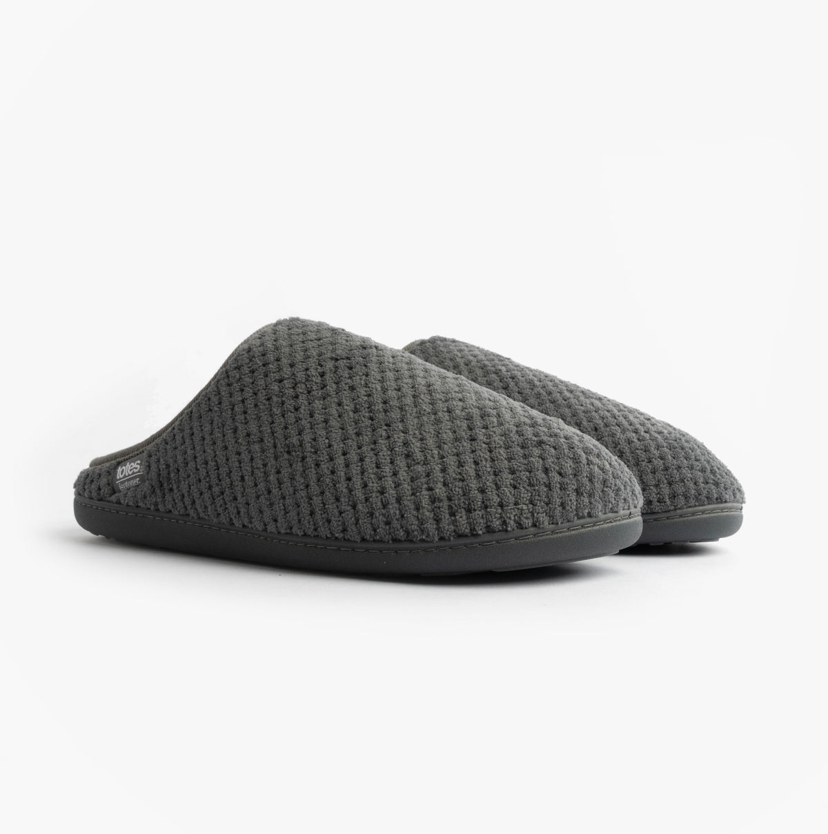 Totes Isotoner SWEPT BACK POPCORN MULE Mens Mule Slippers Grey side view showing textured upper and slip-on design.