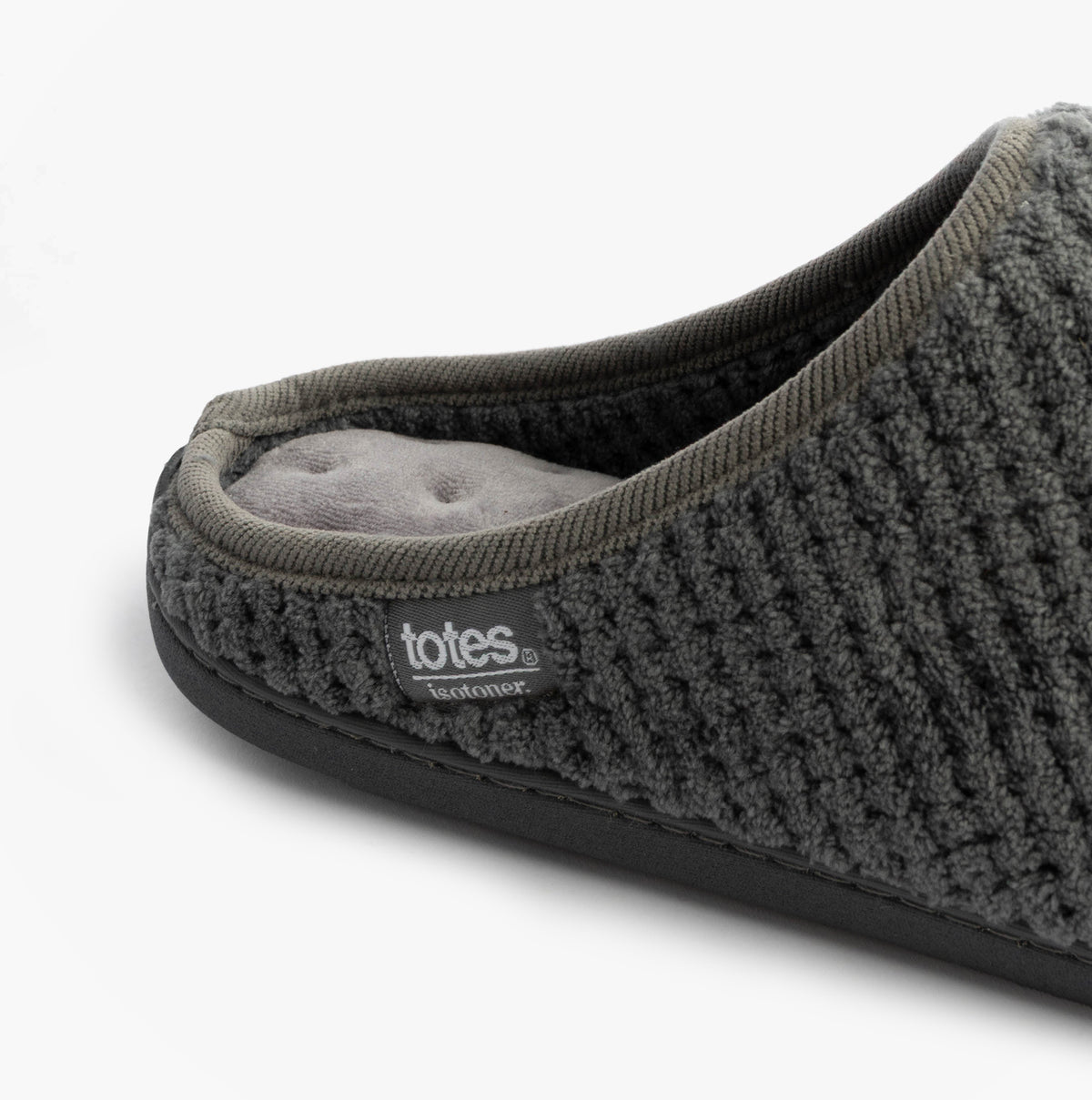Totes Isotoner SWEPT BACK POPCORN MULE Mens Mule Slippers Grey side view showing textured upper and padded interior.